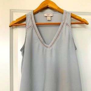 Grey v-neck sleeveless blouse with embroidery